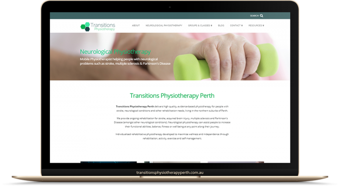 Gold laptop showing the home page from the Transitions Physiotherapy Perth website